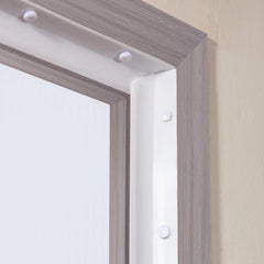 White TPE seal strip for garage door top and sides, shown installed in a gray frame.