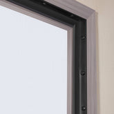 Black TPE garage door seal strip, 20 ft long, shown installed on door top and sides.