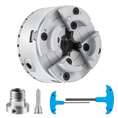 Silver 4-jaw self-centering lathe chuck with reversible jaws and blue T-handle wrench.