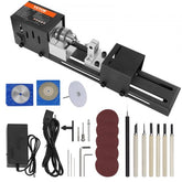 Compact black Bostome mini wood lathe machine with 7-speed control, accessories including chisels, sandpaper, and power adapter.