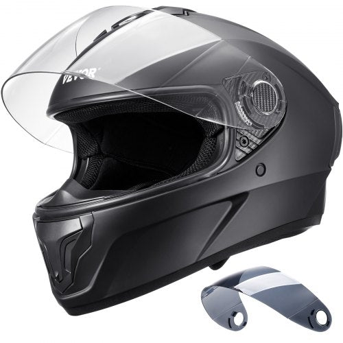 Black XL full-face motocross helmet with clear visor, vents, and Bluetooth slot.
