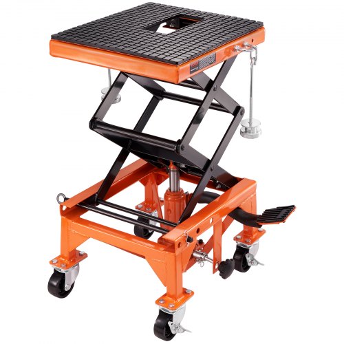 Orange hydraulic motorcycle lift table with wide black non-slip deck and locking casters.