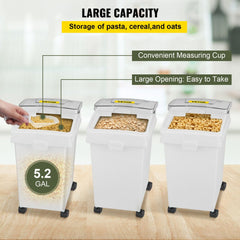 Three white 5.2-gallon plastic storage bins on wheels, with scoops, holding pasta, oats, and cereal.