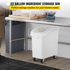White 27-gallon ingredient storage bin with a scoop, sliding lid, and four casters.