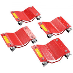 Set of four red heavy-duty wheel dollies with yellow warnings and locking casters.