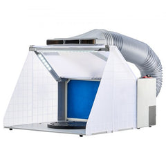 Portable airbrush spray booth with white hood, blue filter, LED lights, turntable, and exhaust hose.