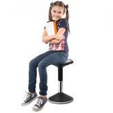 Black height-adjustable wobble chair for kids with 360° swivel and anti-tip base.