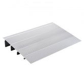 Bostome aluminum threshold ramp with a 4-inch rise, designed for wheelchairs and scooters.