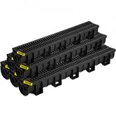 Bostome HDPE trench drain system in black with six interlocking channels and plastic grates.