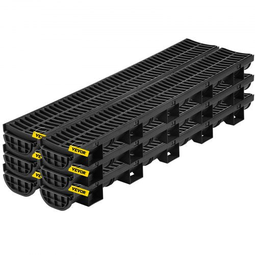 Bostome HDPE trench drain system with black plastic grates in a six-pack for outdoor drainage.