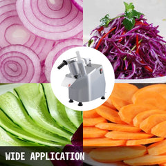 Silver commercial vegetable processor with 6 stainless steel blades, shown slicing onions, cabbage, zucchini, and carrots.