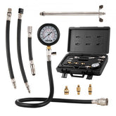 Bostome 9-piece compression tester kit with dual gauge, adapters, hoses, and case.
