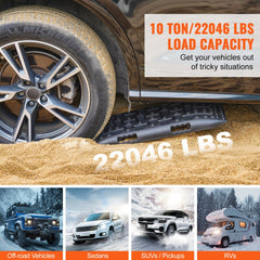 Black Bostome traction boards designed for vehicle recovery in mud, snow, and sand.