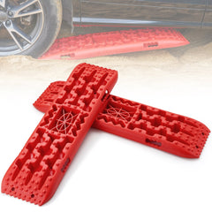 Red traction boards made of PP material, designed for vehicle recovery in mud, snow, and sand.