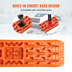 Two orange PP traction boards with built-in socket base for farm jacks, shown with a truck.