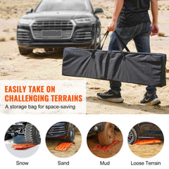 Two orange PP traction boards with 10-ton capacity, stored in a gray carry bag beside an SUV on sand.