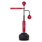 Red Bostome Reflex Boxing Bag with adjustable height and stable suction cup base on a stand.