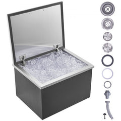 Stainless steel 40 qt drop-in ice chest with open hinged cover filled with ice and drain components.