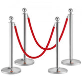 Four stainless steel stanchion posts with red velvet ropes for crowd control and event management.