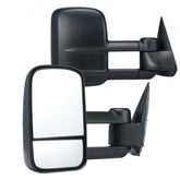 Black manual folding towing mirrors for Chevy Silverado and GMC Sierra models from 1999-2007.