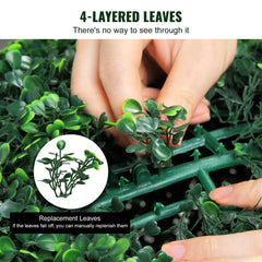 Two 16-inch green artificial boxwood topiary balls made of PE with dense layered leaves.