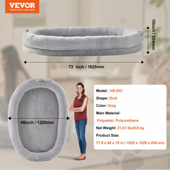 Large gray oval dog bed measuring 72x48x10 inches with faux rabbit fur, sized for humans and pets.