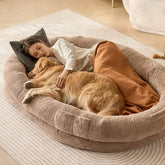 Large dog bed with faux rabbit fur, washable cover, and non-slip bottom, 72x48x10 inches.