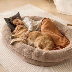 Large human dog bed in faux rabbit fur, 72x48x10 inches, with non-slip bottom and handles.