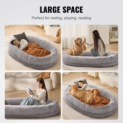 Large gray PV velvet dog bed, 72x48x10in, with humans and dogs resting, playing, and reading on it.
