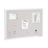 Wall-mounted cork bulletin board with a white linen surface and smooth MDF frame.