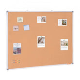 Large cork board with an aluminum frame, ideal for displaying notes and photos.