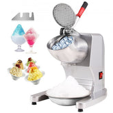 Silver stainless steel electric ice crusher with 300W motor, red handle, and shaved ice samples.