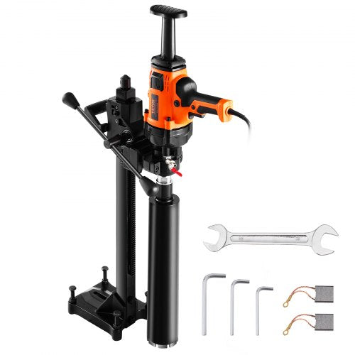 Orange and black 2000W core drill machine with stand, handheld grip, drill bit, wrench, and carbon brushes.