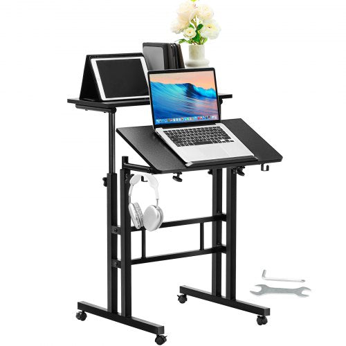 Height adjustable mobile standing desk with gas-spring mechanism and 360° swivel wheels.