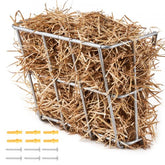 Wall-mounted hay feeder with wire basket filled with hay for horses and goats.