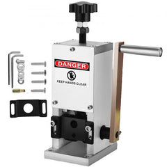 Manual wire stripping machine with hand crank, aluminum frame, and safety labels.
