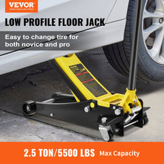 A yellow and black 2.5-ton low-profile floor jack lifting a silver car, with a handle and casters.