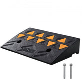 Heavy duty rubber curb ramp with 4.25" rise and 15-ton capacity for safe vehicle access.