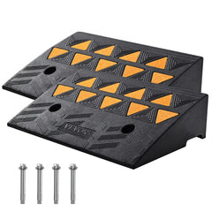 Heavy-duty rubber curb ramp set with a 5-inch rise and 15-ton capacity for easy transitions.