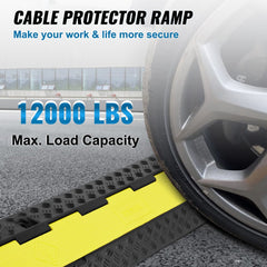 A yellow 3-pack cable protector ramp with 2 channels and 12000 lbs load capacity, shown on pavement with a car wheel.
