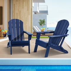 Navy blue folding Adirondack chairs made of HDPE plastic, set of two with wide armrests.