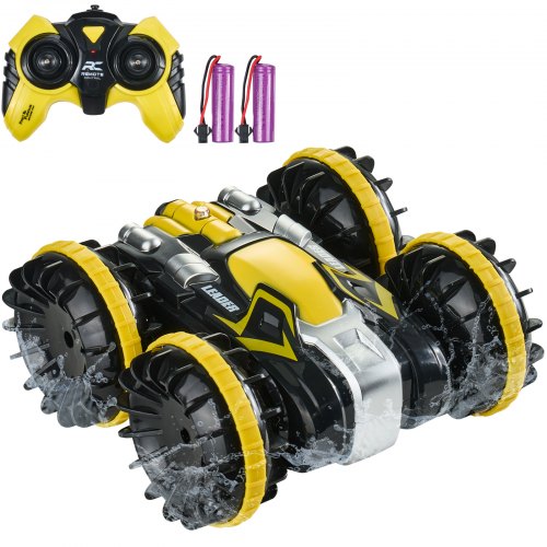 A yellow and black amphibious RC car with a remote control and two batteries.