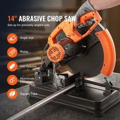 14-inch orange abrasive chop saw with gloved hands adjusting miter angle for metal cutting.