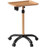 Bostome rolling salon tray cart in gold and black with adjustable height and five swivel wheels.