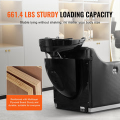 Black shampoo backwash chair with electric footrest, ceramic bowl, and 661 lbs plywood frame.