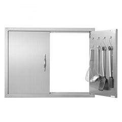 Stainless steel double BBQ access door with reversible panels and built-in utensil hooks.