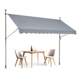 Gray retractable patio awning measuring 138x47 inches with a manual crank handle.