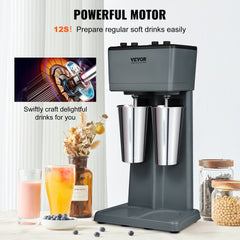 Bostome Double Head Electric Milkshake Machine with dual stainless steel cups and three-speed control.