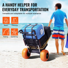 A blue beach dolly with 12-inch orange foam wheels, adjustable handle, and straps, carrying a cooler and bag on sand.