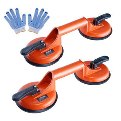 Two orange 4.7-inch glass suction cups with aluminum handles and blue gloves.